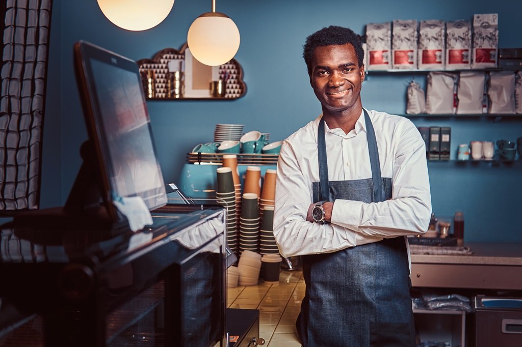 barista in trendy coffee shop